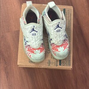 Jordan Blue and Red Sneakers with Iconic Design